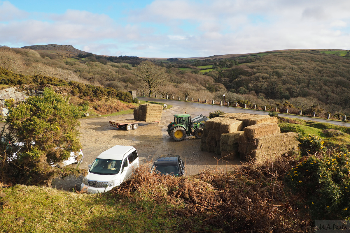 Local farmer uses car park to move hay